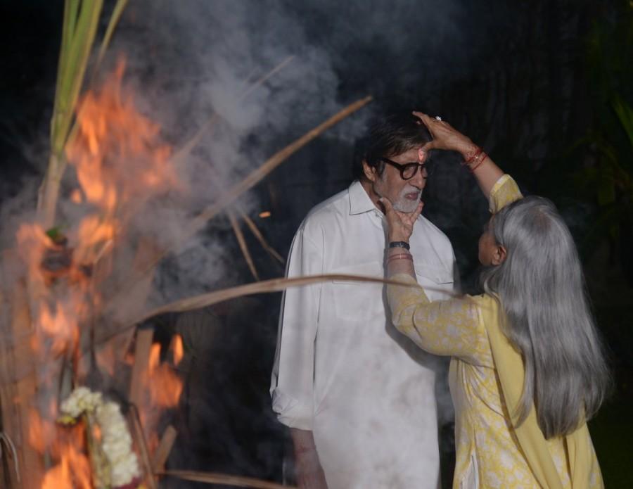 Actor Amitabh Bachchan shared a picture on Twitter with the caption, "T 2730 - the Holika has been burnt and the prayers done .. the 'tilak' colours put .. and the special sweetmeat for the occasion 'gujiya' consumed." Amitabh Bachchan,Amitabh Bachchan celebrates Holi,Aishwarya,Aishwarya Rai Bachchan,Aaradhya bachchan,Aaradhya,Aishwarya celebrates holi,holi,holi festival