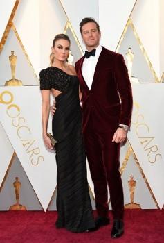 Elizabeth Chambers and Actor Armie Hammer arrive for the 90th Annual Academy Awards on March 4, 2018, in Hollywood, California.