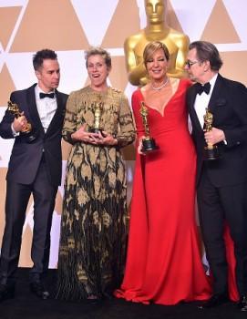 (L-R) Actors Sam Rockwell, Frances McDormand, Allison Janney, and Gary Oldman, pose in the press room with their Oscars for best supporting actor, best actress, best supporting actress, and best actor, during the 90th Annual Academy Awards on March 4, 2018, in Hollywood, California.