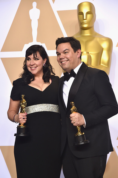 Songwriters Kristen Anderson-Lopez (L) and Robert Lopez winners of the Best Original Song for 'Coco' pose in the press room during the 90th Annual Academy Awards at Hollywood & Highland Center on March 4, 2018 in Hollywood, California. Guillermo del Toro,Frances McDormand,Gary Oldman,Kristen Anderson-Lopez,Robert Lopez,Sam Rockwell,Frances McDormand,Allison Janney,Oscars 2018,Oscars 2018 winners,Oscars winners