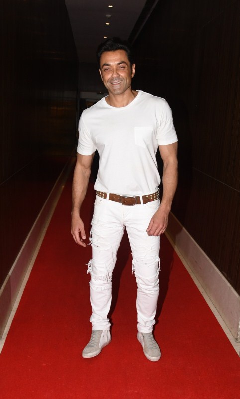 Bobby Deol poses for photographers on his arrival during Genius wrap-up party. Genius wrap-up party,Genius,Genius wrap-up,Bobby Deol,Himesh Reshammiya,Anil Sharma,Ishita,Genius wrap-up party pics,Genius wrap-up party images