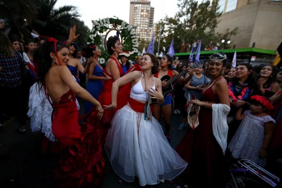 Women take part in a march in Santiago, Chile. International Women's Day 2018,International Women's Day 2018 celebration,Women's day celebration,Women's day celebration pics,Women's day celebration images