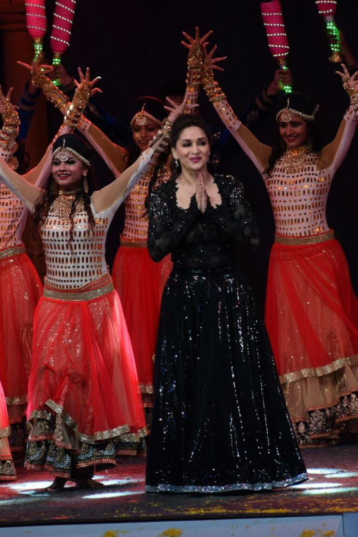 Actress Madhuri Dixit performs during T20 Mumbai Cricket League opening ceremony in Mumbai. Madhuri Dixit,Sidharth Malhotra,Kriti Sanon,Mumbai T20 League opening ceremony,Mumbai T20 league,Mumbai T20 league pics,celebs at Mumbai T20 league,Mumbai T20 league images