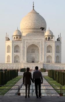 French President Emmanuel Macron (R) and his wife Brigitte Macron visit the Taj Mahal complex in the Indian city of Agra on March 11, 2018.