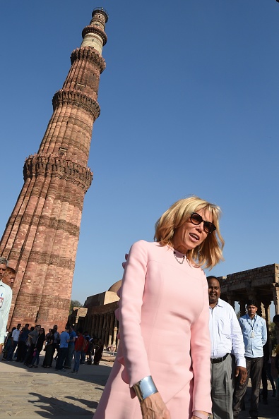 Brigitte Macron, wife of the French President Emmanuel Macron, poses during her visit at the Qutub Minar, site inscribed on the UNESCO World Heritage List, in New Delhi on March 10, 2018. French President Emmanuel Macron,Emmanuel Macron,Emmanuel Macron in India,Emmanuel Macron best moments,Emmanuel Macron best moments in India