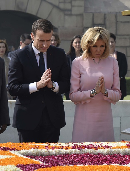 French President Emmanuel Macron and his wife Brigitte Macron pay tribute to the Mahatma Gandhi at his memorial at Rajghat, on March 10, 2018 in New Delhi, India. French President Emmanuel Macron,Emmanuel Macron,Emmanuel Macron in India,Emmanuel Macron best moments,Emmanuel Macron best moments in India