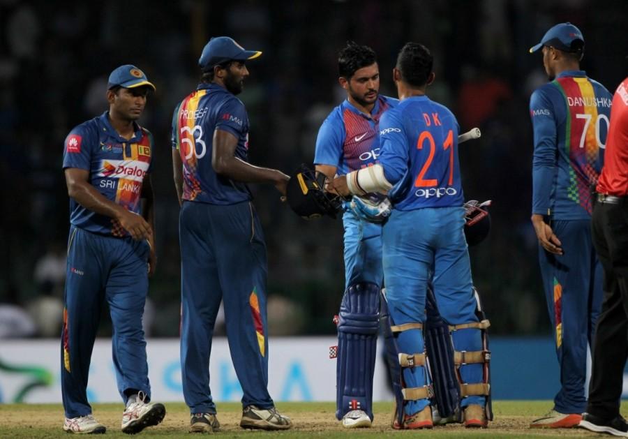 A combined effort helped India beat Sri Lanka by six wickets in the fourth match of the Nidahas Trophy Twenty20 International (T20I) cricket tri-series at the R. Premadasa International Cricket Stadium here on Monday. India beat Sri Lanka,India defeated Sri Lanka,Suresh Raina,Lokesh Rahul,Manish Pandey,Dinesh Karthik,Nidahas Trophy