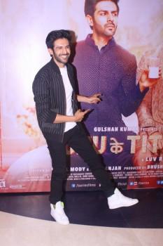 Kartik Aaryan poses for the photographers during Sonu Ke Titu Ki Sweety success party.