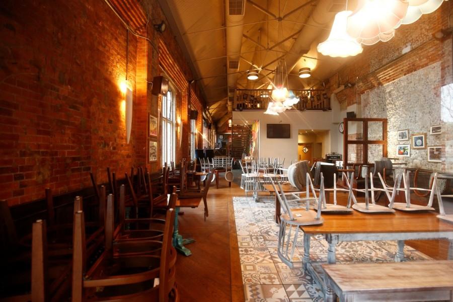 Chairs are seen on tables inside the Mill pub which former Russian inteligence officer Sergei Skripal and his daughter Yulia visited before they were found poisoned on a bench nearby in Salisbury, Britain. Russian double agent,Russian agent,Sergei Skripal,Sergei Skripal and his daughter,former Russian double agent
