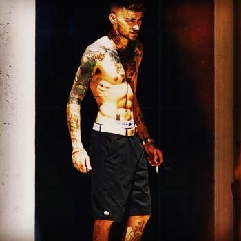 Shirtless Zayn Malik flaunts his forlorn figure as he emerges for the first time since split from Gigi Hadid.