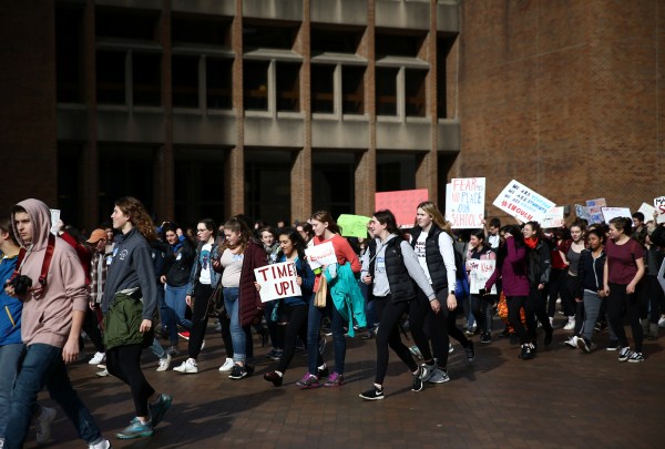 Students from Roosevelt High School arrive at the University of Washington in Seattle, Washington. Florida school shooting,Marjory Stoneman Douglas High School shooting,National School Walkout,protest against gun violence,U.S. Students Protest Gun Violence