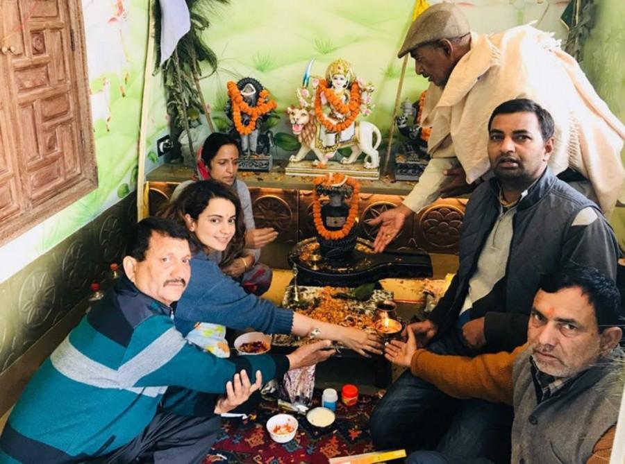 Actress Kangana Ranaut with her family during puja at their new residence in Manali on March 15, 2018. Kangana Ranaut,actress Kangana Ranaut,Kangana Ranaut new house,Kangana Ranaut Manali house,Kangana Ranaut manali mansion,Kangana Ranaut manali house photos,Kangana Ranaut pics,Kangana Ranaut images