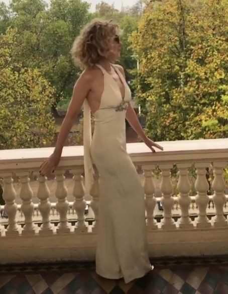 Model Kylie Minogue flaunts her figure in a perilously plunging jumpsuit. Kylie Minogue,singer Kylie Minogue,Kylie Minogue hot pics,Kylie Minogue pics,Kylie Minogue images,Kylie Minogue plunging jumpsuit