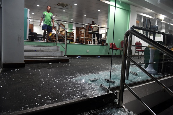 A picture taken on March 16, 2018 shows damages after celebrations by the Bangladesh cricket team pavilion after scoring the winning run to defeat Sri Lanka by 2 wickets during the sixth Twenty20. 2018 Nidahas Trophy,sri lanka national cricket team,Bangladesh cricket,Sri Lanka vs Bangladesh,Dressing room,R Premadasa Stadium,Mahmudullah,Colombo dressing room door,Bangladesh players celebration,Shakib Al Hasan,Sri Lanka Bangladesh cricket fight,Bangl