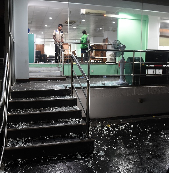 A picture taken on March 16, 2018 shows damages after celebrations by the Bangladesh cricket team pavilion after scoring the winning run to defeat Sri Lanka by 2 wickets during the sixth Twenty20 (T20) international cricket match between Bangladesh and Sri Lanka of the tri-nation Nidahas Trophy at the R. Premadasa stadium in Colombo. 2018 Nidahas Trophy,sri lanka national cricket team,Bangladesh cricket,Sri Lanka vs Bangladesh,Dressing room,R Premadasa Stadium,Mahmudullah,Colombo dressing room door,Bangladesh players celebration,Shakib Al Hasan,Sri Lanka Bangladesh cricket fight,Bangl
