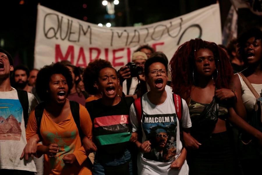 People take part in a rally against the murder of Brazilian councilwoman Marielle Franco, in Sao Paulo, Brazil March 15, 2018. Brazilian activist politician,Brazilian politician,murder of Marielle,Marielle Franco,Rio de Janeiro