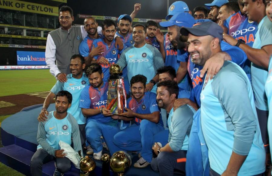 Wicketkeeper batsman Dinesh Karthik (29 runs off eight balls) played a brilliant cameo towards the end as India beat Bangladesh by four wickets in the final of the Nidahas Trophy T20 tri-series at the R.Premadasa Stadium here on Sunday. IND vs BAN,Ind vs Ban result,Dinesh Karthik,Dinesh Karthik six,Rohit Sharma,India beats Bangladesh,Bangladesh,Nidahas Trophy final,Nidahas Trophy final winner