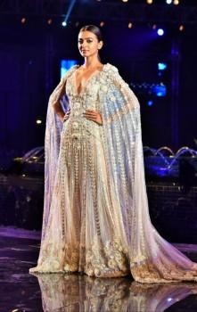 Taking the ramp by storm in a Manish Malhotra creation for the first time, She gracefully carried herself in a white sheer chiffon Grecian gown with embroidery of flowers and a trail. She re defined elegance.