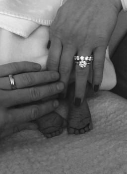 Schweinsteiger tweeted a photo of his and his wife's hands resting atop their new baby's tiny feet, under the caption 