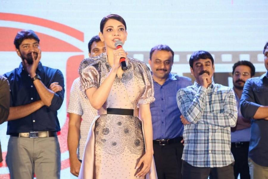 Kajal Aggarwal addresses media during MLA pre-release event. Kalyan Ram,Kajal Aggarwal,Allari Naresh,MLA pre-release event,MLA,Telugu movie MLA,MLA pre-release event pics,MLA pre-release event images,celebs at MLA pre-release