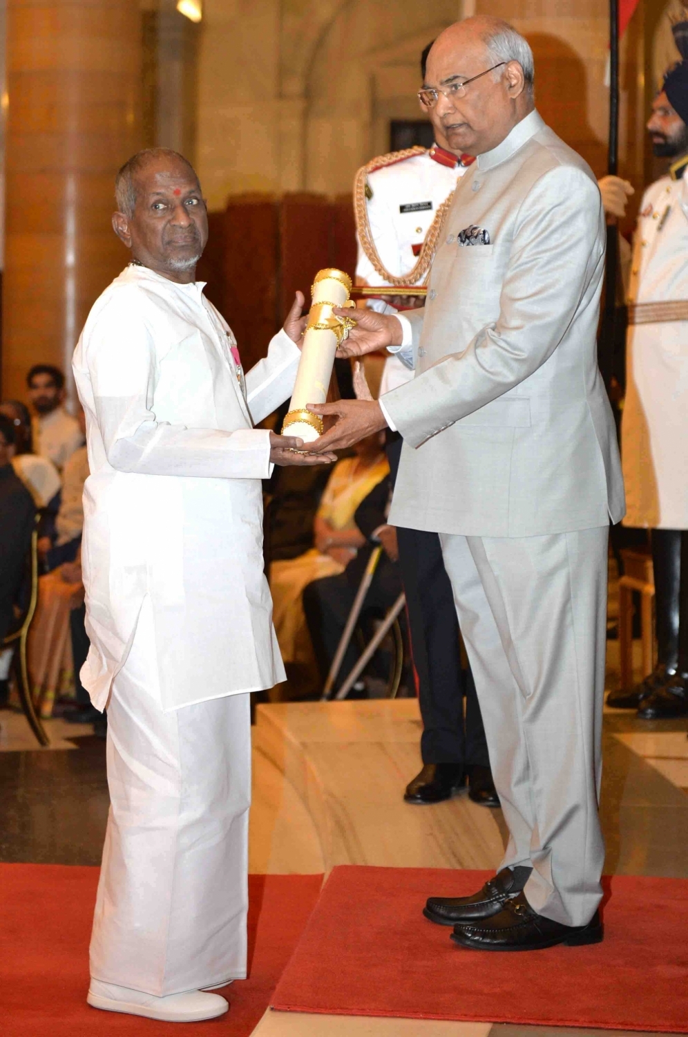 Music maestro Ilayaraja receives Padma Vibhushan from President Ram Nath Kovind at the Civil Investiture Ceremony, at Rashtrapati Bhavan. Ilaiyaraaja,Music maestro Ilaiyaraaja,Ilaiyaraaja honored with Padma Vibhushan,Padma Vibhushan,President Kovind,Kovind