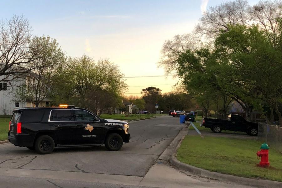 A Texas Department of Public Safety vehicle blocks a street into the neighborhood where the Austin bomb suspect may lived in Pfluggerville, Texas, March 21, 2018. Austin,Texas bombing spree
