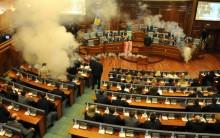 Kosovo opposition politicians release tear gas in parliament to obstruct a session in Pristina, Kosovo.