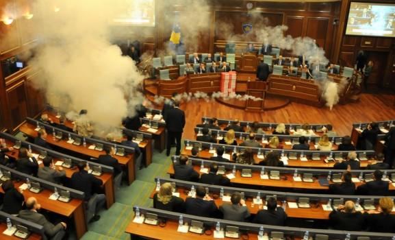 Kosovo opposition politicians release tear gas in parliament to obstruct a session in Pristina, Kosovo.