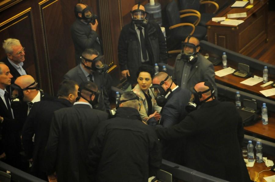 Kosovo opposition politicians release tear gas in parliament to obstruct a session in Pristina on March 21, 2018. Kosovo,Kosovo protest,Kosovo opposition,Kosovo politicians,Pristina,Kosovo Parliament,Pristina Parliament,Parliament tear gas,tear gas in Parliament