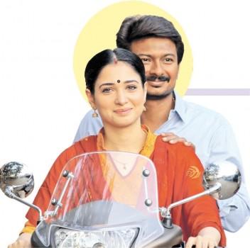 Here is the first look of Tamil movie Kanne Kalaimaane written, directed by Seenu Ramasamy and produced by Udhayanidhi Stalin under Red Giant Movies banner. Starring Udhayanidhi Stalin and Tamannaah in the lead role.