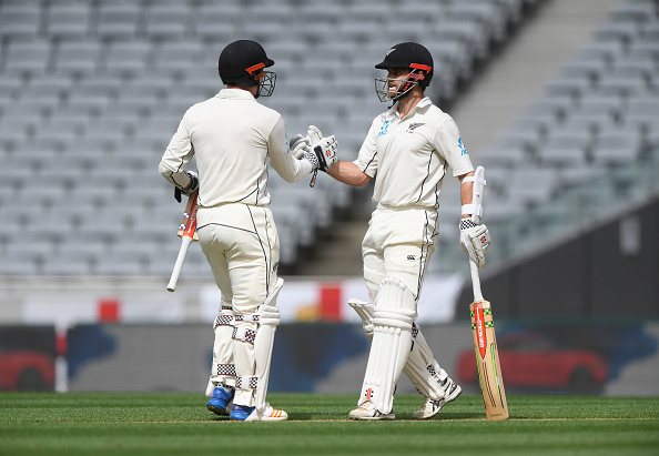 New Zealand batsman Kane Williamson (r) is congratulated by Henry Nicholls after reaching his century during day two of the First Test Match between the New Zealand Black Caps and England at Eden Park on March 23, 2018 in Auckland, New Zealand. Kane Williamson,Kane Williamson hundred,Kane Williamson century,New Zealand vs England,New Zealand and England,New Zealand vs England pics,New Zealand vs England images