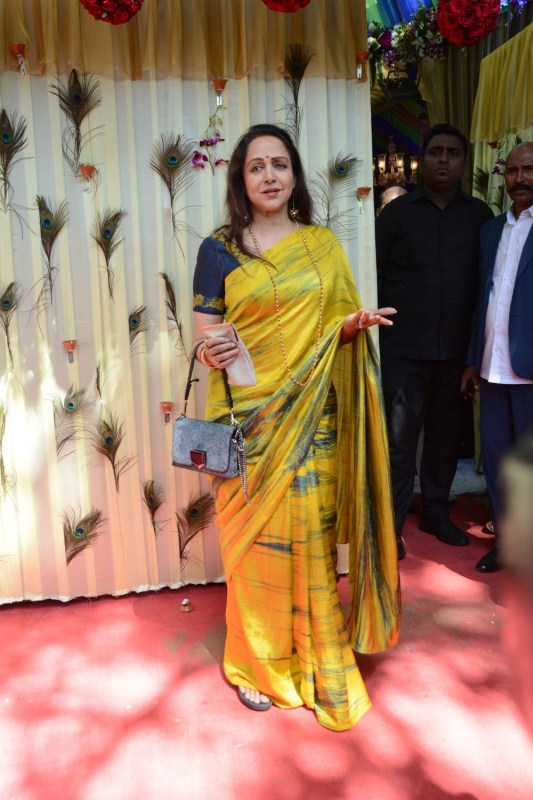 Actress and politician Hema Malini during the rice ceremony (annaprasanna) of Bappi Lahiri's grandson, in Mumbai. Jayaprada,Hemamalini,Neetu Chandra,Amar Singh,Randhir Kapoor,Bappi Lahiri,Bappi Lahiri grandson Annaprashan party,Krishh,Krishh Annaprashan party