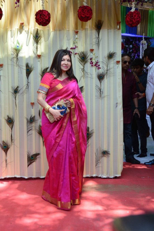 Singer Alka Yagnik during the rice ceremony (annaprasanna) of Bappi Lahiri's grandson, in Mumbai. Jayaprada,Hemamalini,Neetu Chandra,Amar Singh,Randhir Kapoor,Bappi Lahiri,Bappi Lahiri grandson Annaprashan party,Krishh,Krishh Annaprashan party
