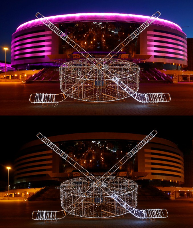 A general view of Minsk Arena complex before and after the lights are dimmed to mark Earth Hour, in Minsk, Belarus. Before and after pictures,Before and after,Before and after pics,Before and after images,World marks Earth Hour 2018,World marks Earth Hour
