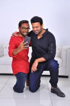 Here is the latest pictures of actor Prabhas with his fan.