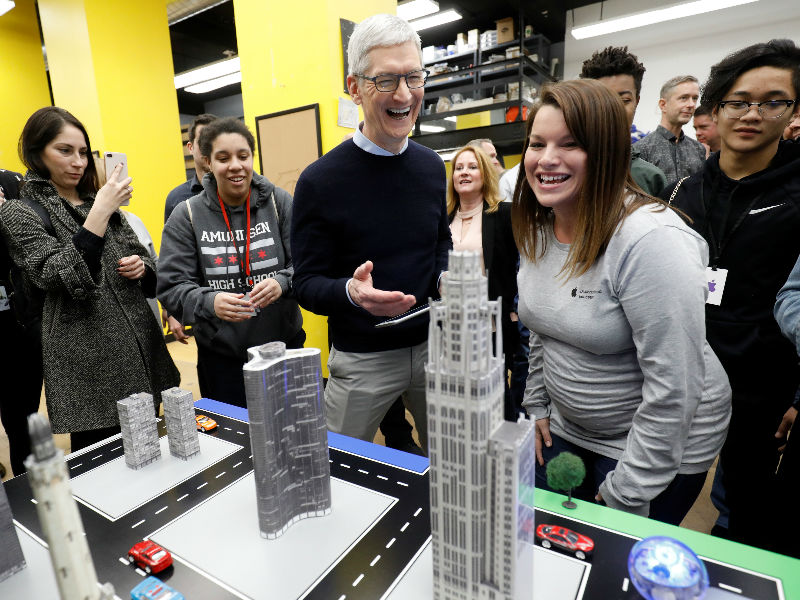 Tim Cook, Chief Executive Officer of Apple Inc., drives a remote control vehicle with an iPad in a technology lab at an education-focused event at Lane Technical College Prep High School in Chicago, Illinois, U.S. Apple,Apple CEO Tim Cook,Apple educational event,Apple Pencil,Cassey Williams,Cathleen Richardson,chicago,Froggipedia App,Greg Joswiak,IOS,ipad,iPad 9.7,iPhone,Lane Technical College Prep High School,Susan Prescott,Tim Cook