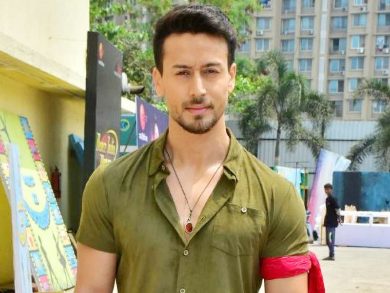 Tiger was busy giving his nod of approval to the camo trend in the coolest way ever. The actor sported a denim shirt featuring camo sleeves and a camo hoodie. This was teamed with a pair of grey pants and the same white kicks as before. Tiger Shroffs,Tiger Shroffs fashion,Baaghi 2,tiger shroff baaghi 2,Baaghi 2 star,Baaghi 2 actor,Tiger Shroffs casual look