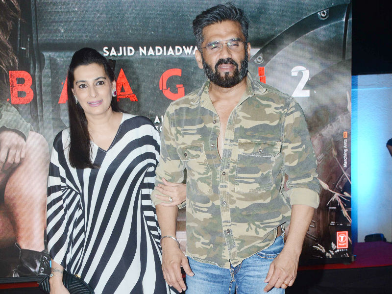 Suniel Shetty and Mana Shetty pose together as they arrive at the special screening of Baaghi 2 in Mumbai on March 30, 2018. Akshay Kumar,Disha Patani,Huma Qureshi,Vivek Oberoi,Suniel Shetty,Tiger Shroff,Baaghi 2,Baaghi 2 special screening,Baaghi 2 special screening pics,Baaghi 2 special screening images