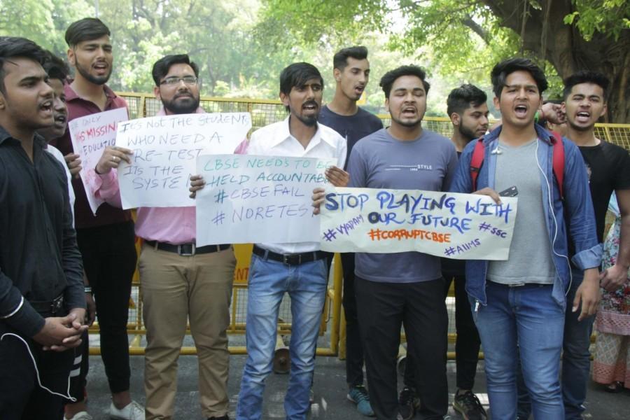 Students stage a demonstration against re-examination after the leak of CBSE Class X Maths and Class XII Economics papers, at Parliament Street in New Delhi on March 29, 2018. CBSE Class X Maths,CBSE X Maths,XII Economics papers,CBSE paper leak,CBSE leak