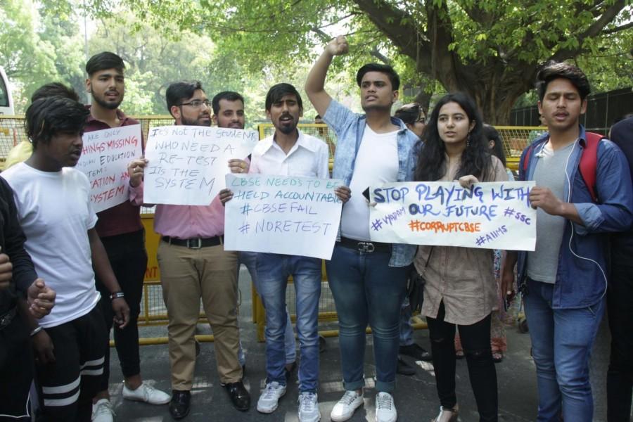 Some of the protesters tried climbing over the police barricades outside the office in Preet Vihar but were rebuffed. CBSE Class X Maths,CBSE X Maths,XII Economics papers,CBSE paper leak,CBSE leak