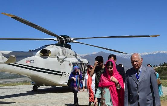 Malala Yousafzai, 20, along with her parents, State Information Minister Marriyum Aurangzeb and others landed near her family home in Mingora in the morning amid tight security, the Pakistani media reported.