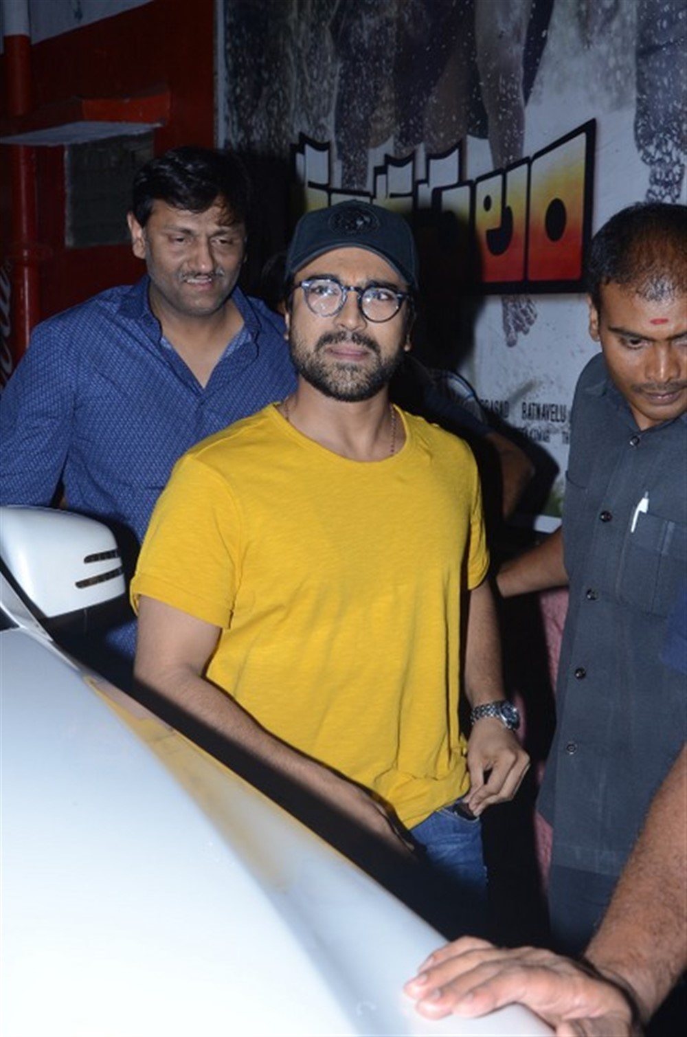 Actor Ram Charan poses for a photo as he leaves the Sudarshan theater after watching Rangasthalam movie. Rangasthalam,Rangasthalam movie,Ram Charan watches Rangasthalam,Ram Charan,Ram Charan Teja,Ram Charan at Sudarshan theater,Ram Charan pics,Ram Charan images