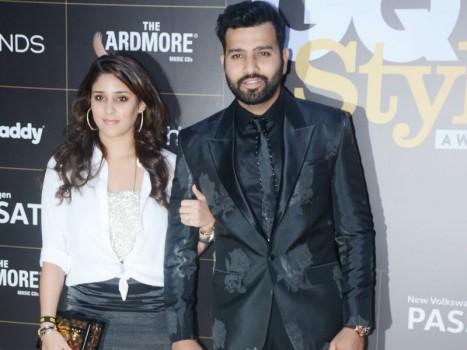 Rohit Sharma and his wife Ritika Sajdeh pose together as they arrive at the GQ Style Awards 2018 held at Taj Lands End in Bandra, Mumbai.