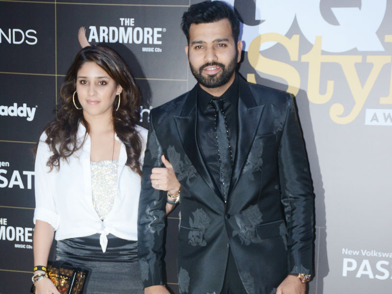 Rohit Sharma and his wife Ritika Sajdeh pose together as they arrive at the GQ Style Awards 2018 held at Taj Lands End in Bandra, Mumbai. Rohit Sharma,Isabelle Kaif,Huma Qureshi,Sapna Pabbi,Akshay Oberoi,Jim Sarbh,Nushrat Bharucha,GQ Style Awards 2018,GQ Style Awards,celebs at GQ Style Awards 2018,GQ Style Awards 2018 pics,GQ Style Awards 2018 images