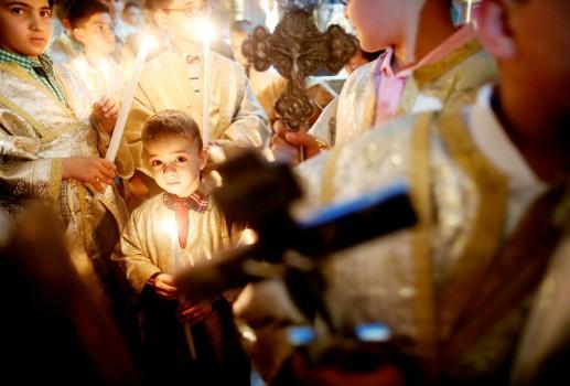 Palestinian Christians attend a service on Easter Sunday at the Saint Porfirios church in Gaza City.