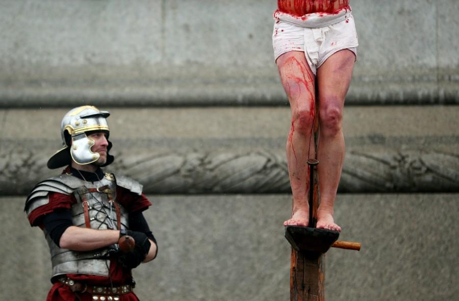 Actor James Burke-Dunsmore playing Jesus performs in The Passion of Jesus at Trafalgar Square in London. Christians,Easter,Easter 2018,Easter celebration,Easter celebration pics,Easter celebration images,Easter around the world,Easter celebration around the world