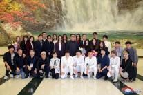 North Korean leader Kim Jong Un poses with South Korean K-pop singers in Pyongyang on April 2, 2018.