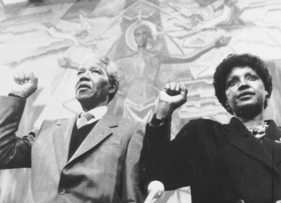 Nelson Mandela and his wife Winnie give the clench fist salute as they sing the hymn of the African National Congress during their appearance before the World of Churches Ecumenical Centre in Geneva June 8, 1990. Winnie Mandela,Winnie Mandela dead,Winnie Mandela passed away,Winnie Madikizela-Mandela,Nelson Mandela,Anti-apartheid campaigner