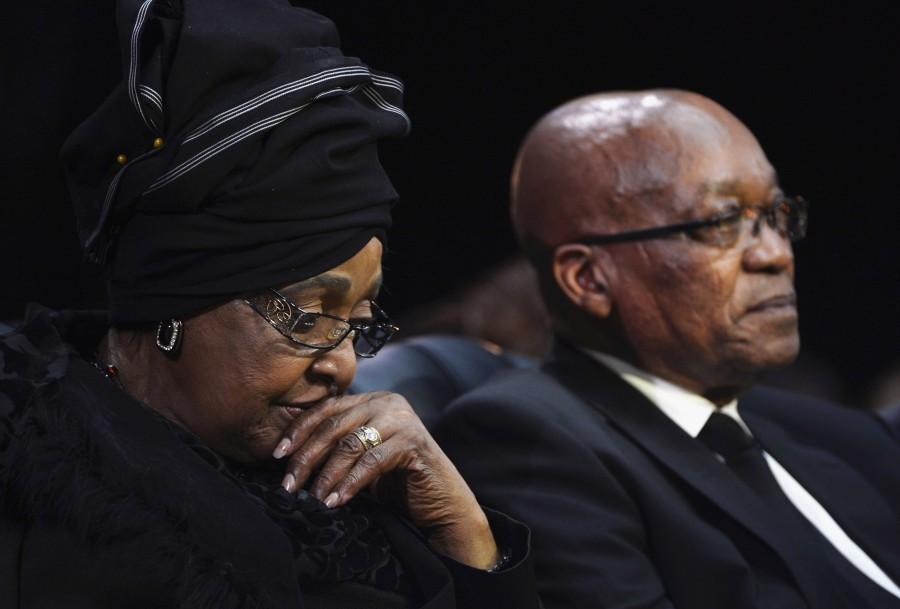 Winnie Mandela (L), ex-wife of former South African President Nelson Mandela, and South African President Jacob Zuma attend Nelson Mandela's funeral ceremony in Qunu December 15, 2013. Winnie Mandela,Winnie Mandela dead,Winnie Mandela passed away,Winnie Madikizela-Mandela,Nelson Mandela,Anti-apartheid campaigner