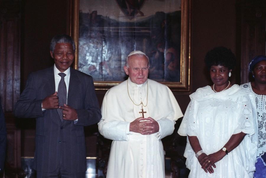 Pope John Paul meets with Nelson Mandela and his wife Winnie at the Vatican June 15, 1990. Mandela is mid-way through a tour aimed at persuading governments to maintain sanctions against South Africa until apartheid is abolished. Winnie Mandela,Winnie Mandela dead,Winnie Mandela passed away,Winnie Madikizela-Mandela,Nelson Mandela,Anti-apartheid campaigner
